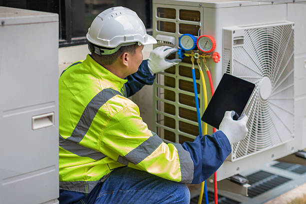 Professional Air Conditioning Repair technician working in Smithville, NJ